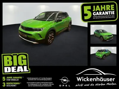 Gebraucht Opel Mokka Elegance 101 PS (74 kW) 2022 Matcha green/ikone gruen (metallic) SUV