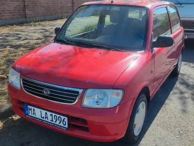 Brugt Daihatsu Cuore Plus 56 HK (41 kW) 2003 Rød Hatchback