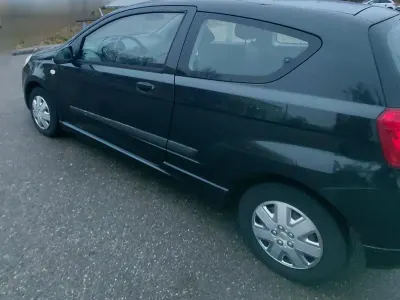 Gebraucht Chevrolet Aveo 64 PS (47 kW) 2010 Schwarz Limousine