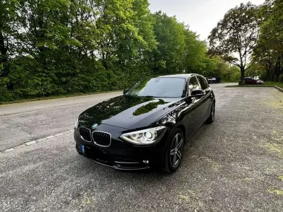 Gebraucht BMW 116 Sport Line 116 PS (85 kW) 2012 Schwarz Kleinwagen