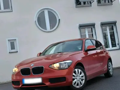 Gebraucht BMW 116 Sport Line 136 PS (100 kW) 2012 Orange Kleinwagen