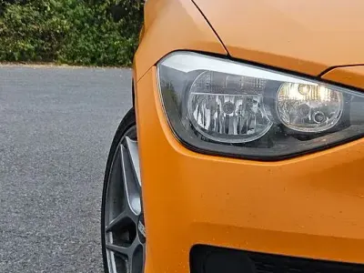Gebraucht BMW 116 Sport Line 136 PS (100 kW) 2013 Orange Kleinwagen
