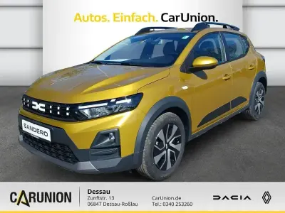 Neu Dacia Sandero Expression 110 PS (80 kW) 2026 Amber yellow Limousine