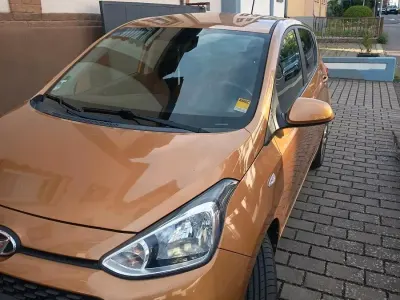 Gebraucht Hyundai i10 69 PS (50 kW) 2017 Orange Kleinwagen