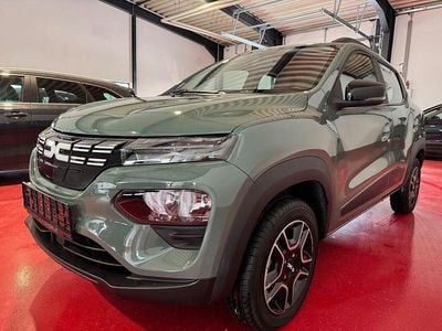 Gebraucht Dacia Spring Essentiel 33 kW (45 PS) 2023 Olivgrün Kleinwagen