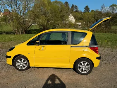 Gebraucht Peugeot 1007 Premium 115 PS (84 kW) 2005 Gelb Van / Kleinbus