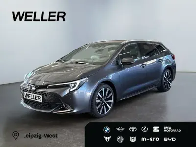 Neu Toyota Corolla Hybrid 196 PS (144 kW) 2026 Grau Kombi