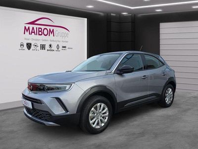 Gebraucht Opel Mokka-e Edition 100 kW (136 PS) 2022 Kontrast grau/quarz silber SUV