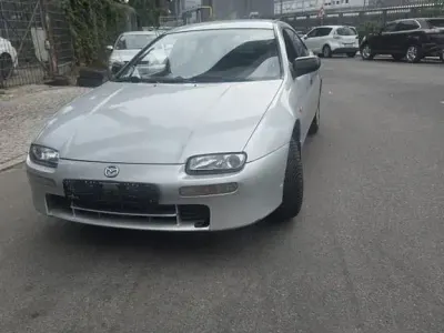 Gebraucht Mazda 323 88 PS (64 kW) 1996 Grau Limousine