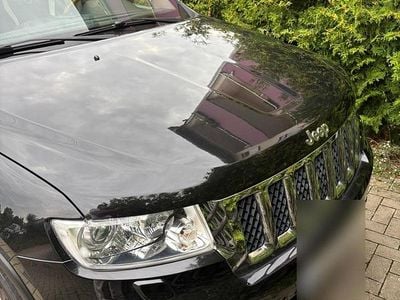 Second-hand Jeep Grand Cherokee Overland 241 CP (177 kW) 2012 Negru SUV