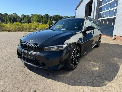Gebraucht BMW 320e Shadowline 204 PS (150 kW) 2023 Schwarz Kombi