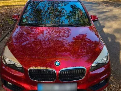 Second-hand BMW 218 136 CP (100 kW) 2015 Roșu Break