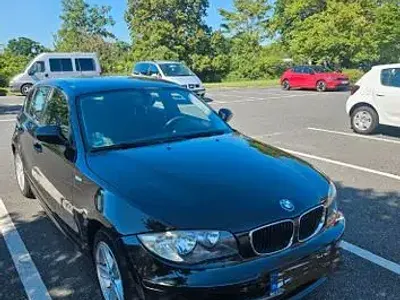 Gebraucht BMW 116 122 PS (89 kW) 2010 Schwarz Kleinwagen