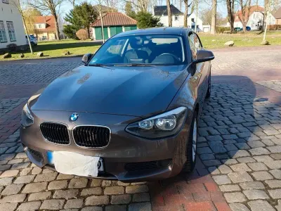 Begagnad BMW 114 102 HK (75 kW) 2014 Brun Halvkombi