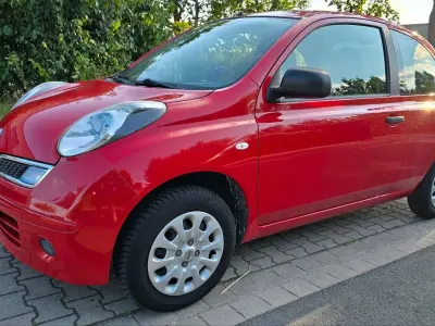 Gebraucht Nissan Micra 65 PS (47 kW) 2010 Rot Kleinwagen