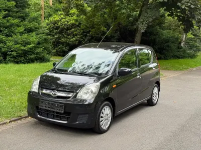 Gebraucht Daihatsu Cuore 69 PS (50 kW) 2007 Schwarz Kleinwagen
