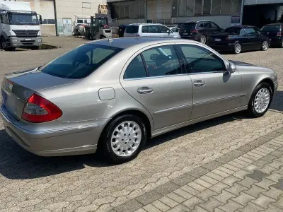 Second-hand Mercedes E200 Elegance 184 CP (135 kW) 2006 Argintiu Berlinǎ