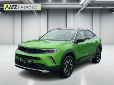 Gebraucht Opel Mokka Elegance 136 PS (100 kW) 2023 Matcha green/ikone gruen SUV