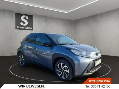 Gebraucht Toyota Aygo X 72 PS (52 kW) 2025 Celestite grey metallic SUV