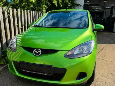 Gebraucht Mazda 2 75 PS (55 kW) 2009 Grün Kleinwagen