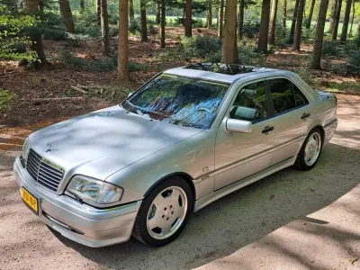 Używany Mercedes C36 AMG AMG 280 KM (205 kW) 1995 Szary Sedan/Limuzyna