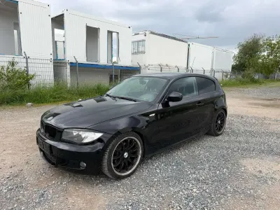 Używany BMW 116 122 KM (89 kW) 2011 Czarny Hatchback