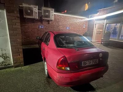 Gebraucht Mitsubishi Carisma 100 PS (73 kW) 1997 Rot Limousine