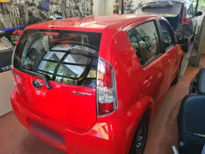 Second-hand Subaru Justy 69 CP (50 kW) 2010 Roșu Hatchback