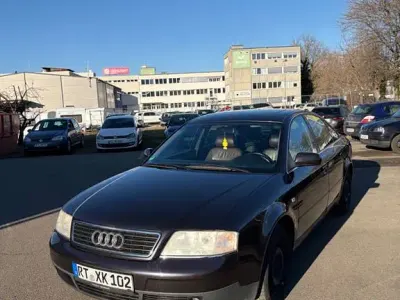 Używany Audi A6 165 KM (121 kW) 1999 Purpurowy Sedan/Limuzyna
