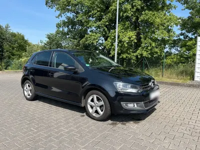 Gebraucht VW Polo Team 69 PS (50 kW) 2010 Schwarz Kleinwagen