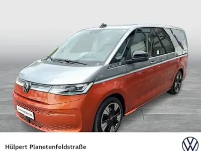 Używany VW Multivan Style 150 KM (110 kW) 2023 Pomarańczowy Minivan