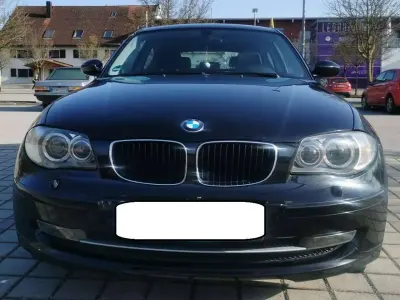Gebraucht BMW 116 122 PS (89 kW) 2009 Schwarz Kleinwagen