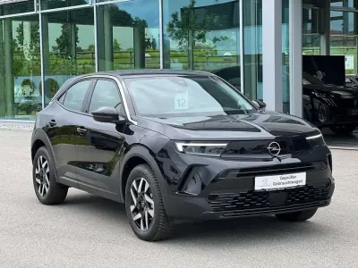 Gebraucht Opel Mokka-e Elegance 100 kW (136 PS) 2024 Karbon schwarz metallic SUV