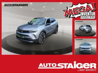 Gebraucht Opel Mokka Ultimate 131 PS (96 kW) 2023 Kontrast grau/quarz silber SUV
