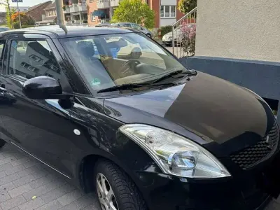 Gebraucht Suzuki Swift 94 PS (69 kW) 2011 Schwarz Kleinwagen