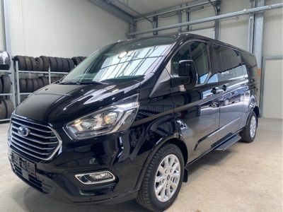 gebraucht Ford Tourneo Custom L2 Titanium X 150 mHEV 8 Sitz Klima Vor+Hint PDC Temp SHZ LMF Kamera NAVI Leder AHK 230V