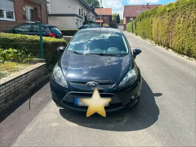 Gebraucht Ford Fiesta 82 PS (60 kW) 2012 Schwarz Limousine
