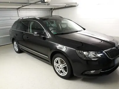 Używany Skoda Superb Elegance 170 KM (125 kW) 2014 Czarny Sedan/Limuzyna