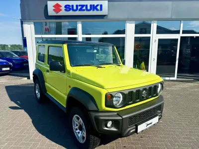 Gebraucht Suzuki Jimny Comfort 102 PS (75 kW) 2021 Kinetic yellow/bluish black SUV