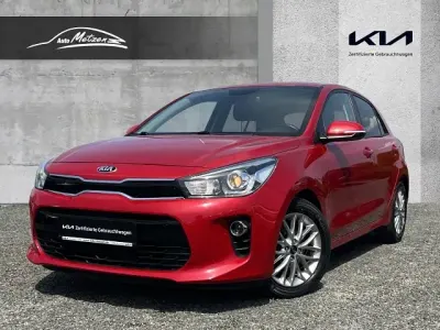 Gebraucht Kia Rio DREAM-TEAM Edition 101 PS (74 kW) 2019 Beg) signalrot met. (rot Limousine
