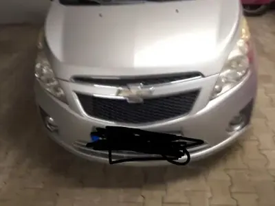 Second-hand Chevrolet Spark LS 68 CP (50 kW) 2012 Argintiu Hatchback