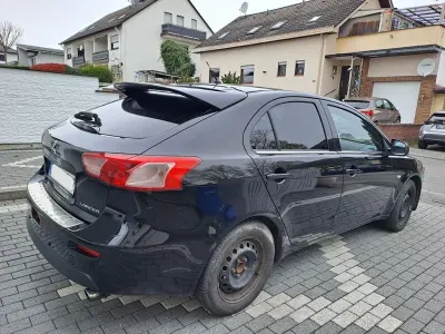 Gebraucht Mitsubishi Lancer 204 PS (150 kW) 2011 Schwarz Limousine