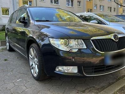 Second-hand Skoda Superb 170 CP (125 kW) 2012 Negru Break
