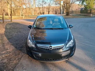 Gebraucht Opel Corsa 69 PS (50 kW) 2014 Schwarz Kleinwagen