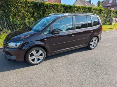 Gebraucht VW Touran Life 105 PS (77 kW) 2013 Violet Van / Kleinbus