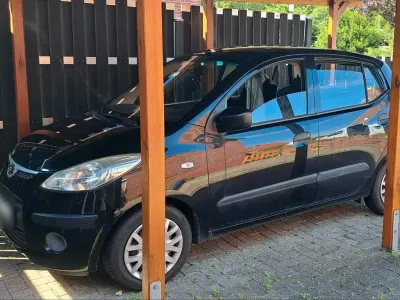 Gebraucht Hyundai i10 66 PS (48 kW) 2010 Schwarz Kleinwagen