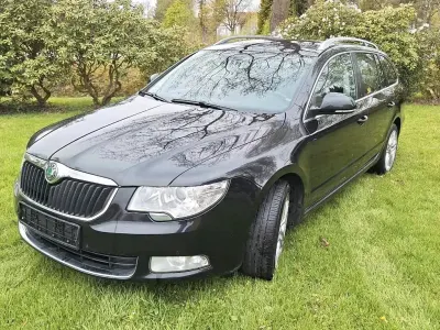 Occasion Skoda Superb 140 PK (102 kW) 2011 Zwart Stationwagen