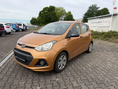 Gebraucht Hyundai i10 Classic 67 PS (49 kW) 2015 Mandarin orange/copper gold Kleinwagen