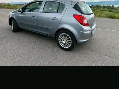 Usado Opel Corsa S 80 HP (58 kW) 2007 Cinzento Citadino