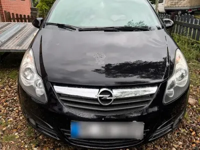 Używany Opel Corsa 66 KM (48 kW) 2010 Czarny Hatchback